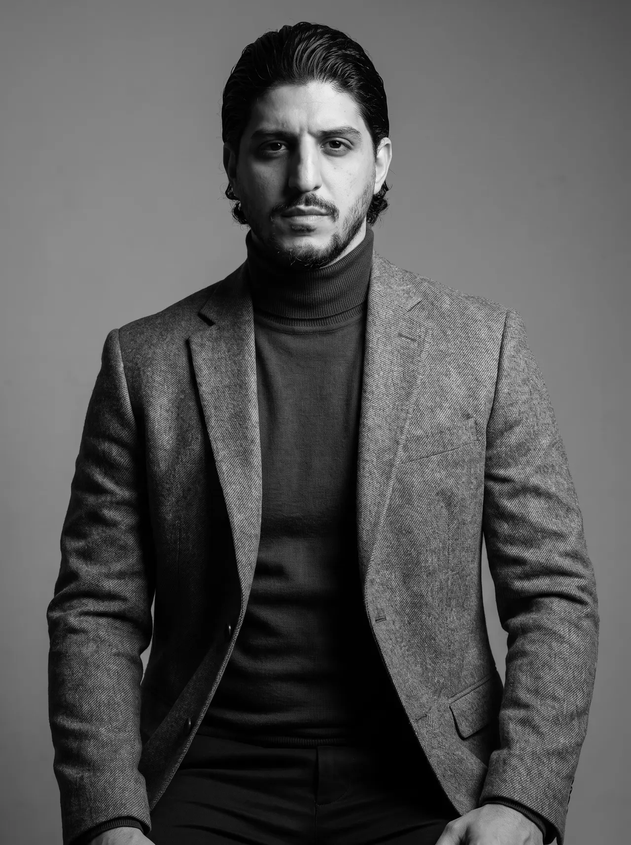Pasha Amidi, founder and entrepreneur, black-and-white portrait